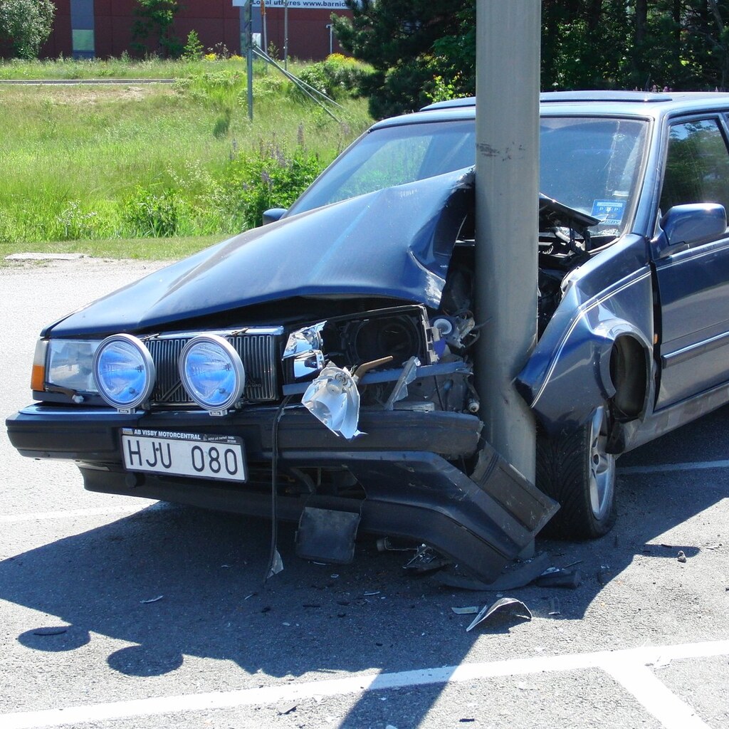 Photo of a car crashed into a pole