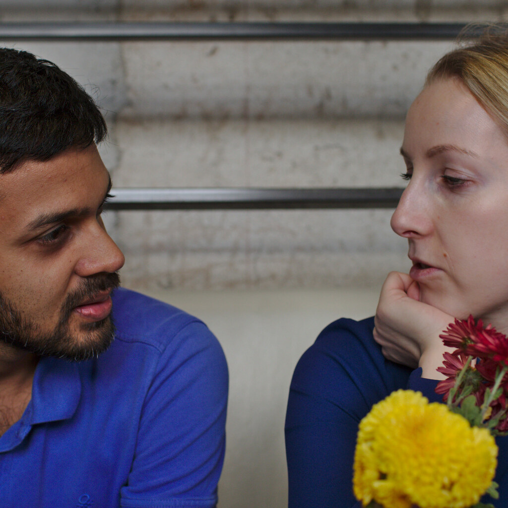Photo of two people talking