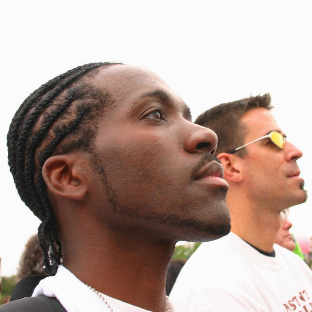 Photo of a man with cornrows