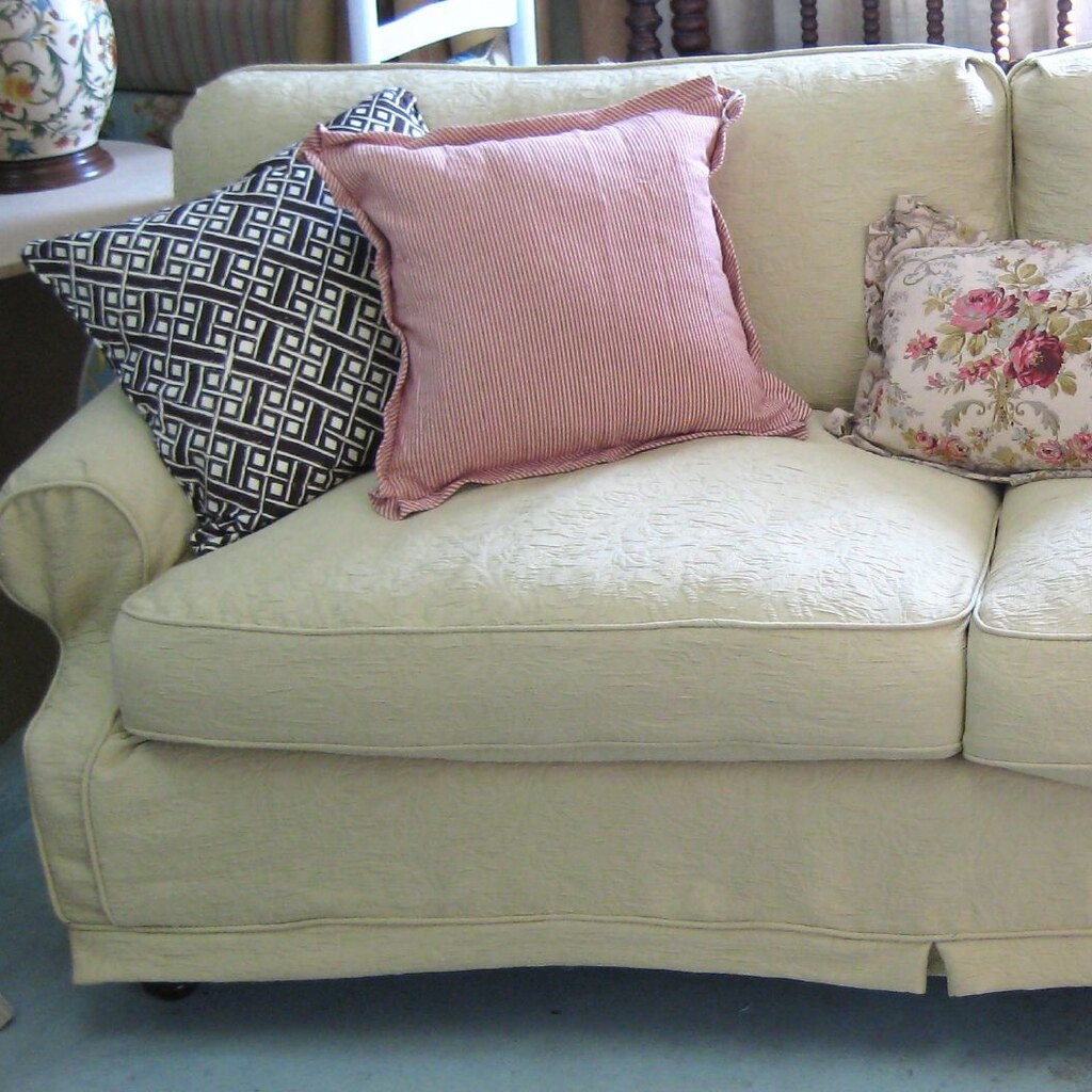 Photo of cushions on a lounge.
