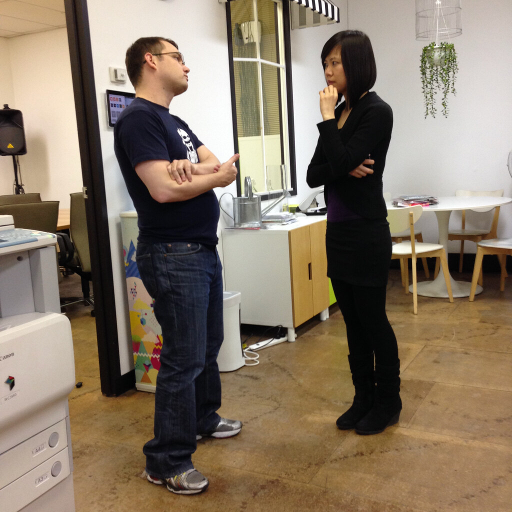 Photo of two people talking