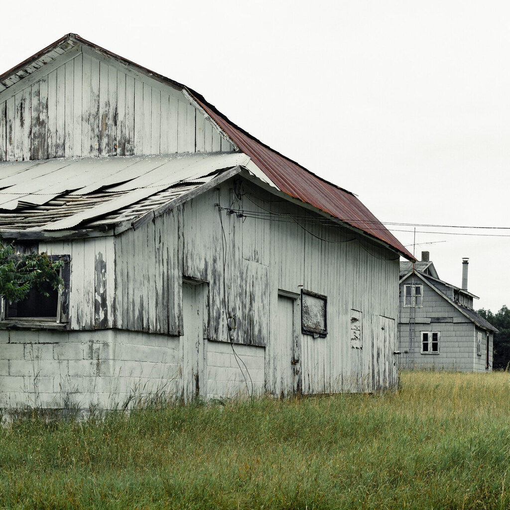 Photo of a barn in a state of disrepair