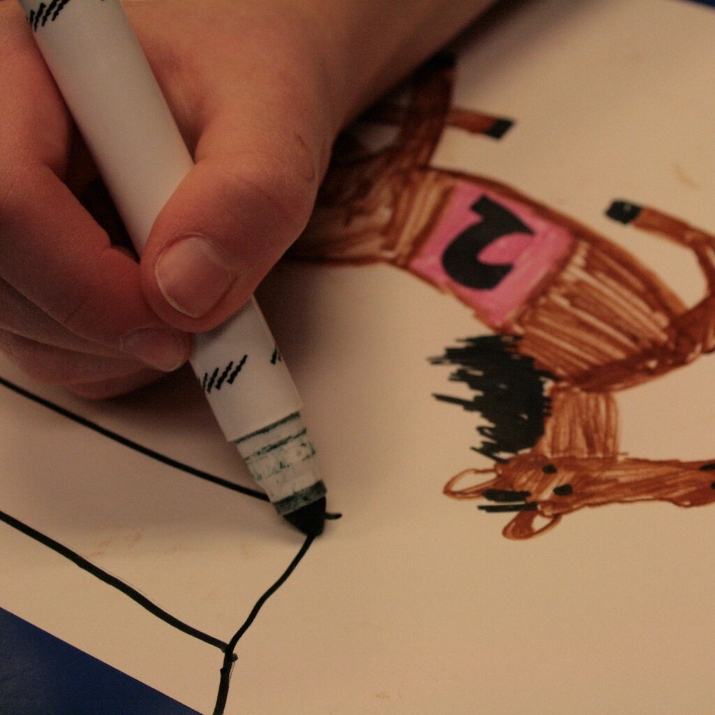 Photo of someone drawing a picture.