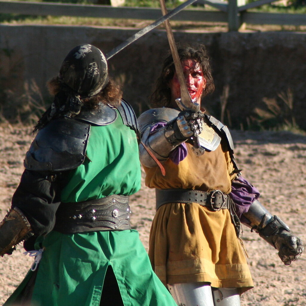 Photo of two people having a duel
