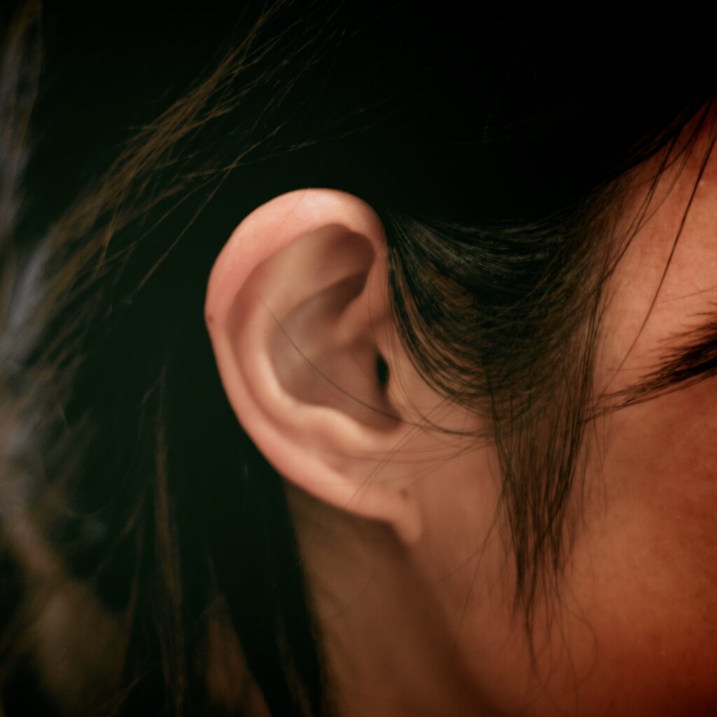 Photo of a woman's ear.