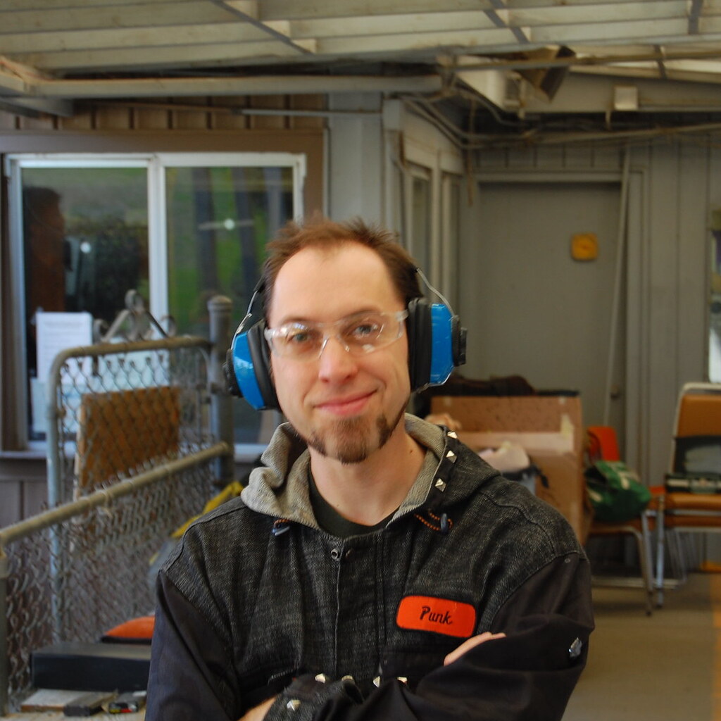 Photo of a man wearing earmuffs