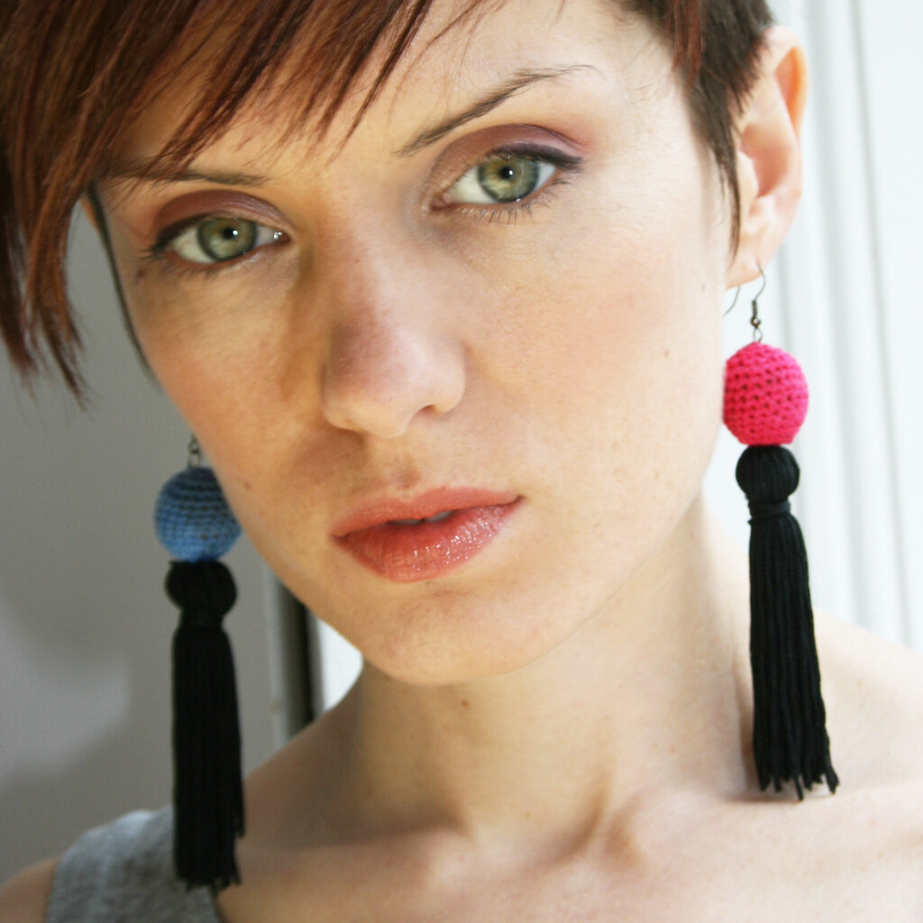 Photo of a woman wearing earrings