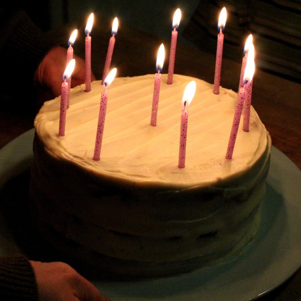 Photo of a cake with 11 candles