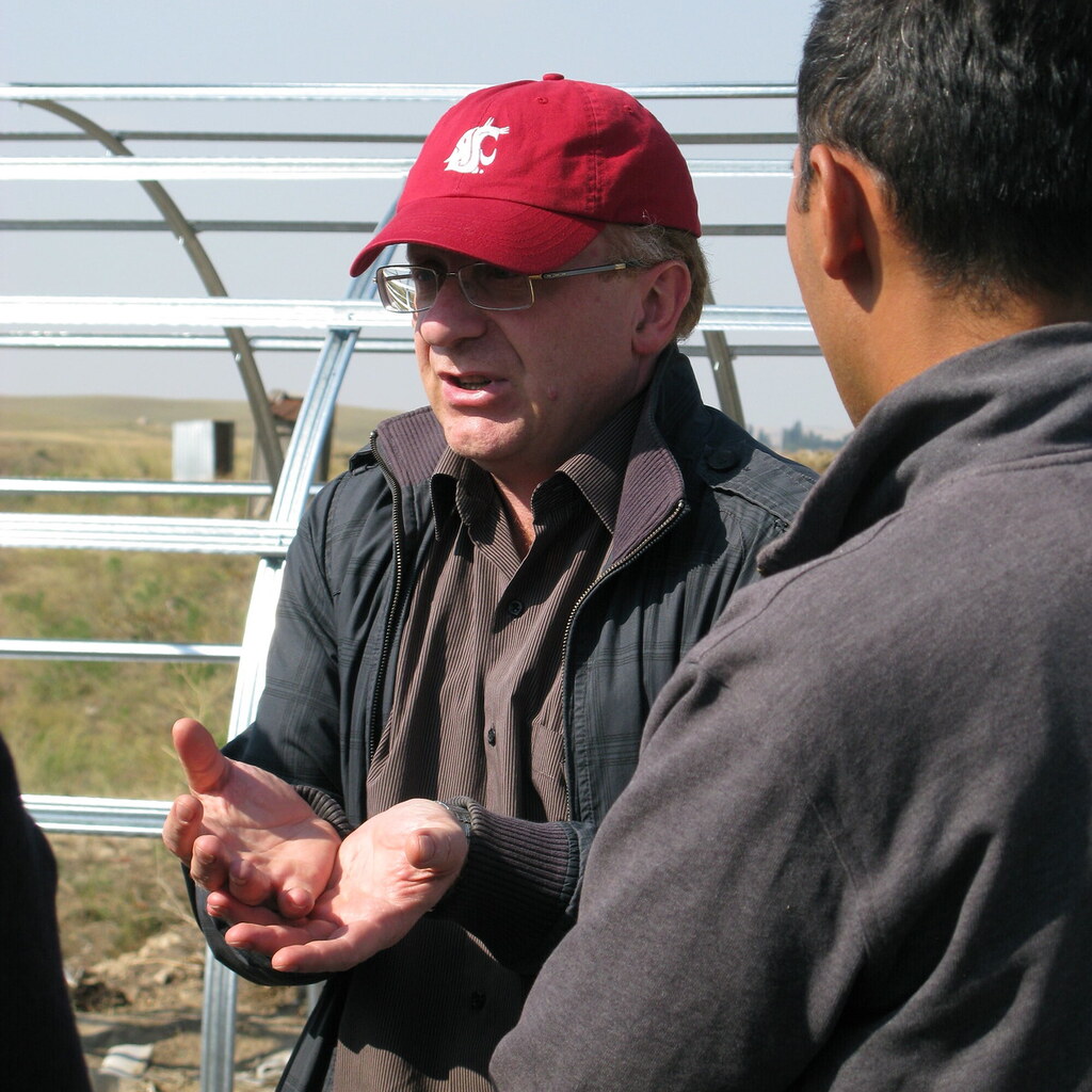 Photo of a man explaining something