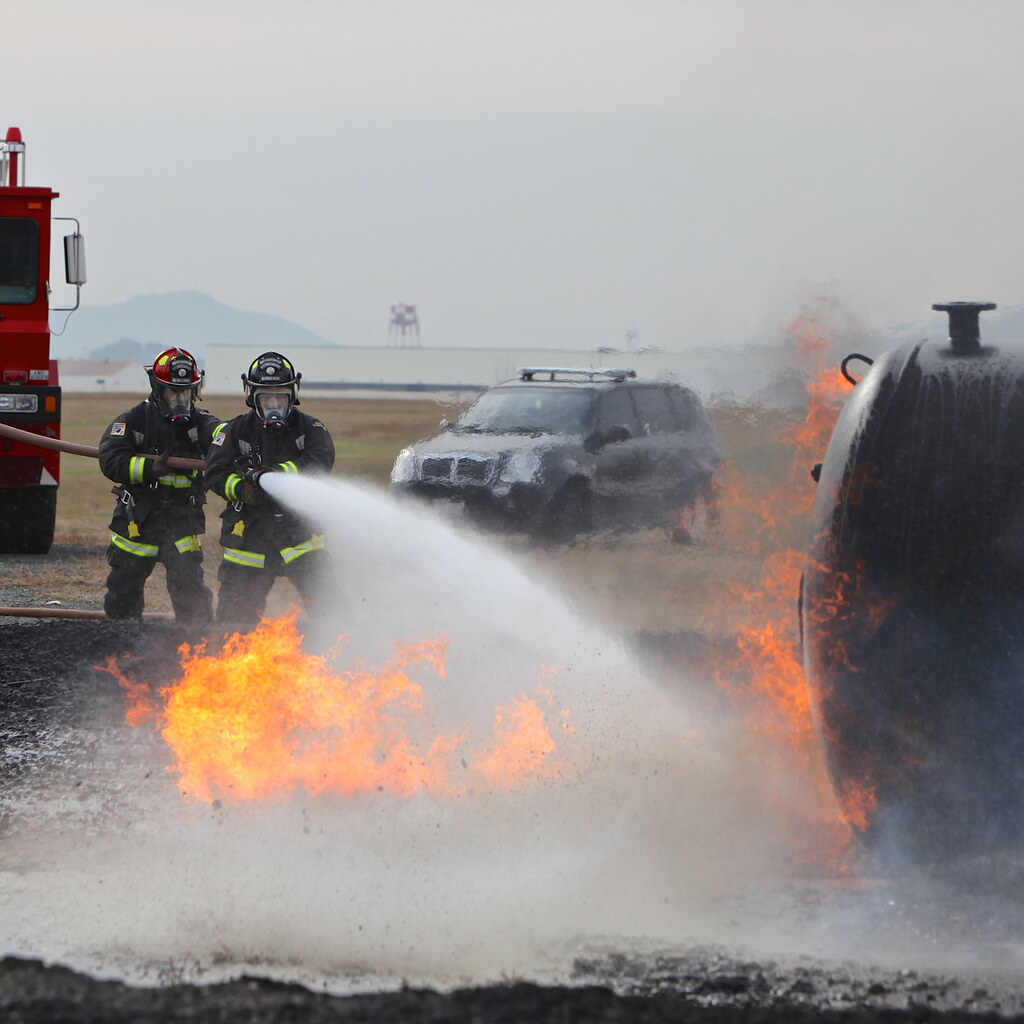 Photo of firefighters extinguishing a fire