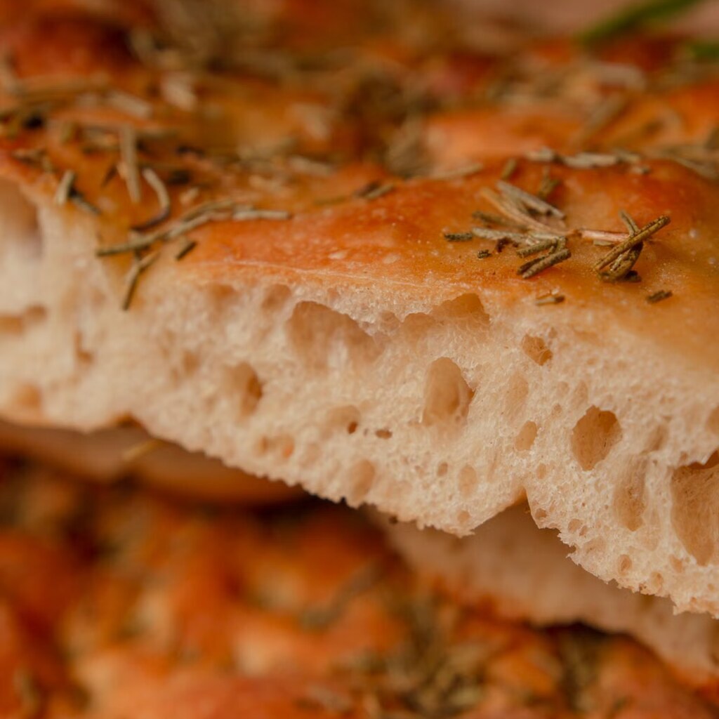 A photo of rosemary focaccia bread.
