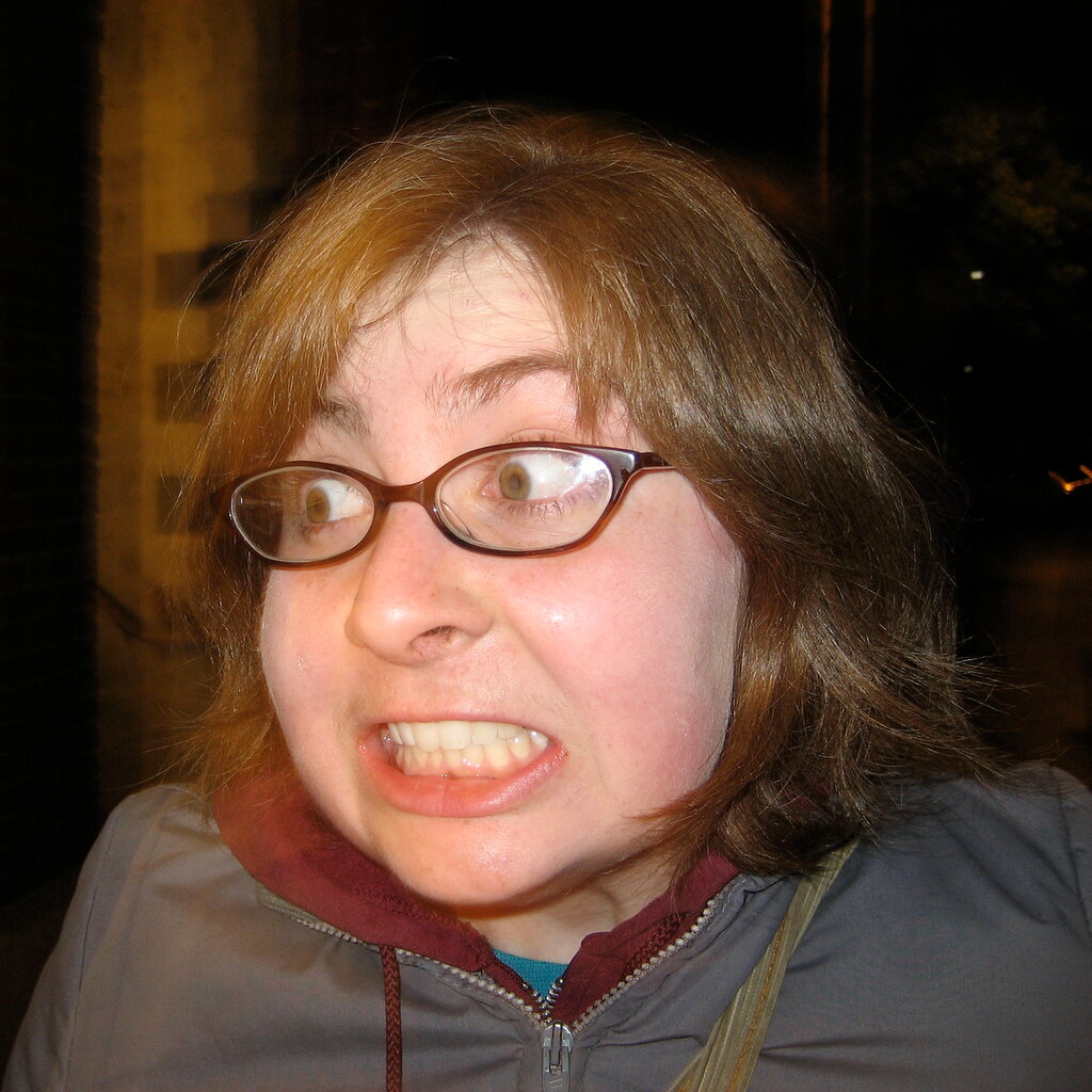 Photo of a woman gnashing her teeth