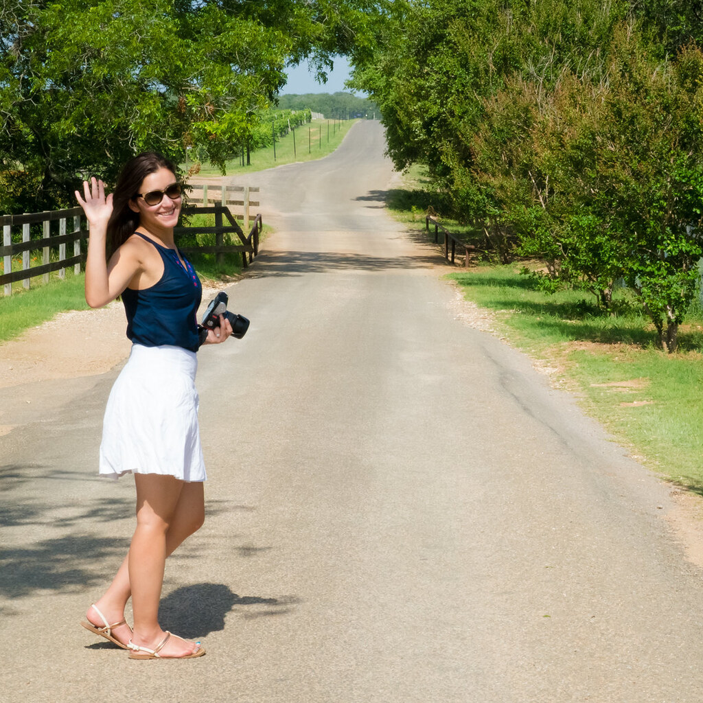 Photo of a woman waving goodbye