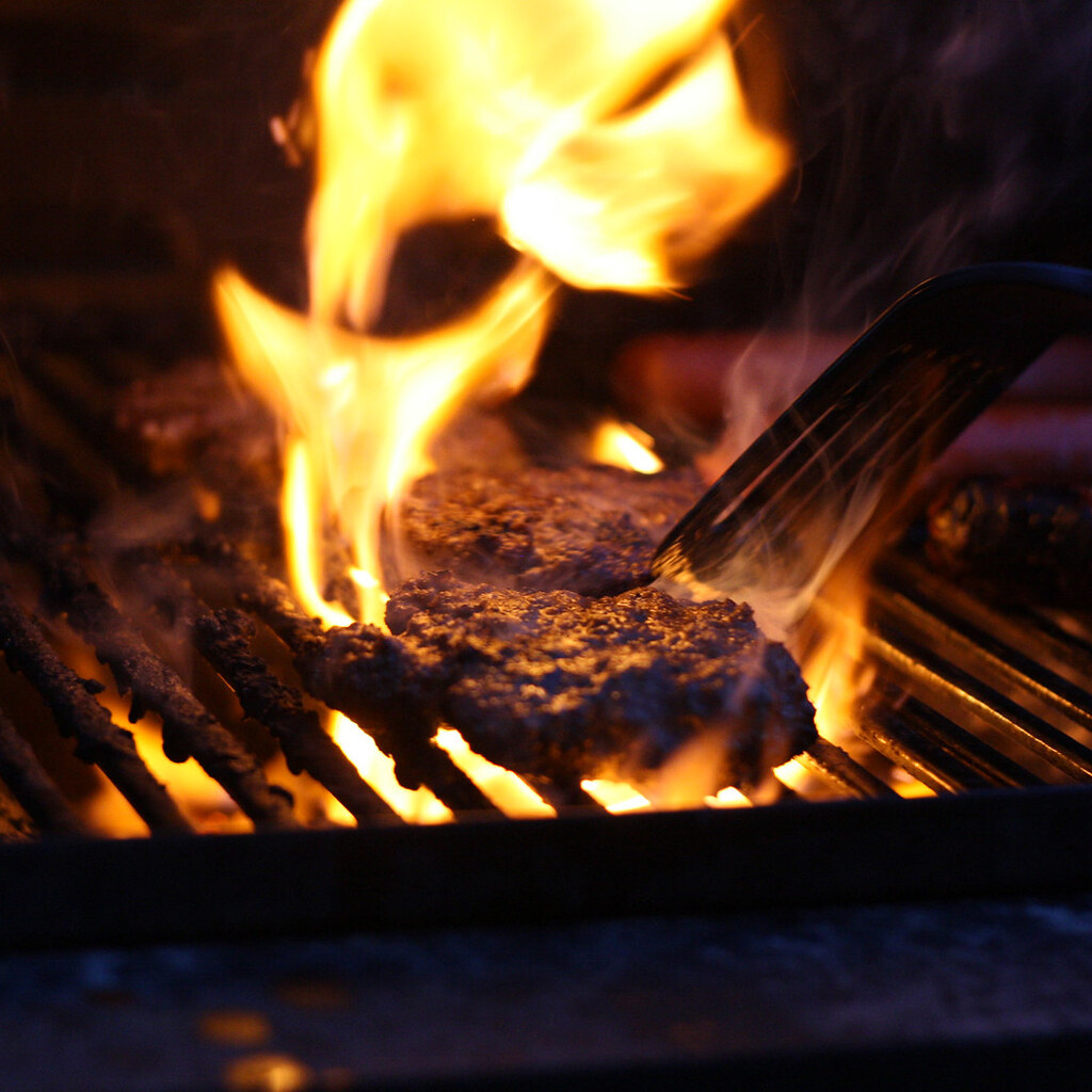 Hamburgers on a grill.