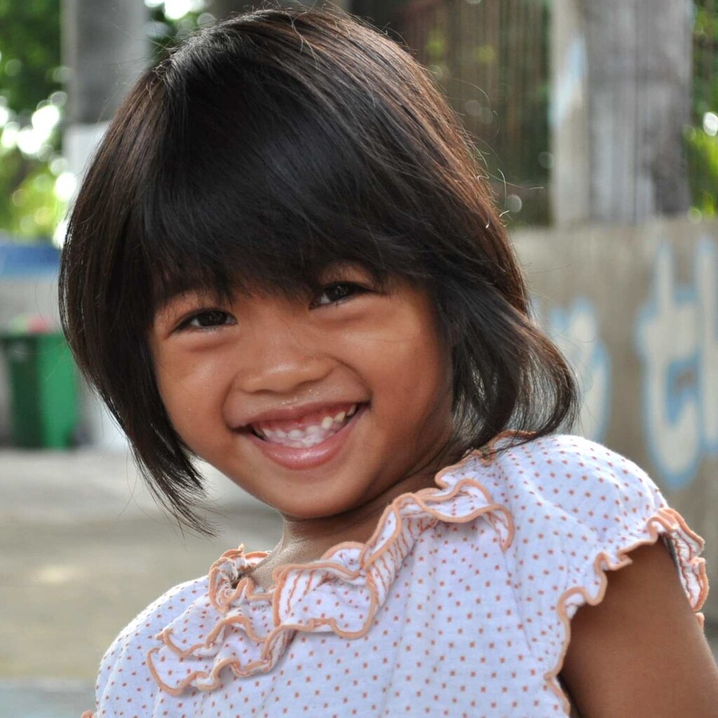 Photo of a little girl grinning