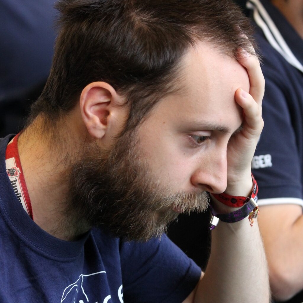 Photo of a man groaning