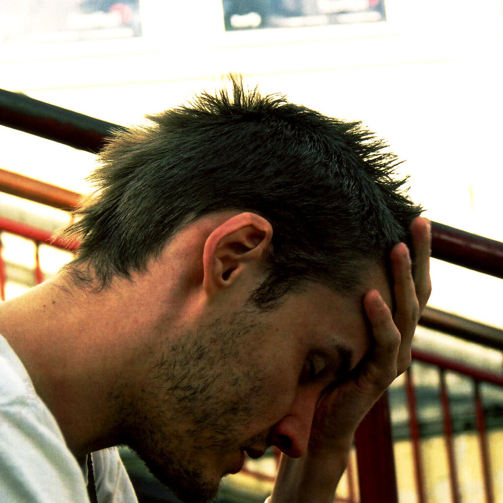 Photo of a man with a hangover