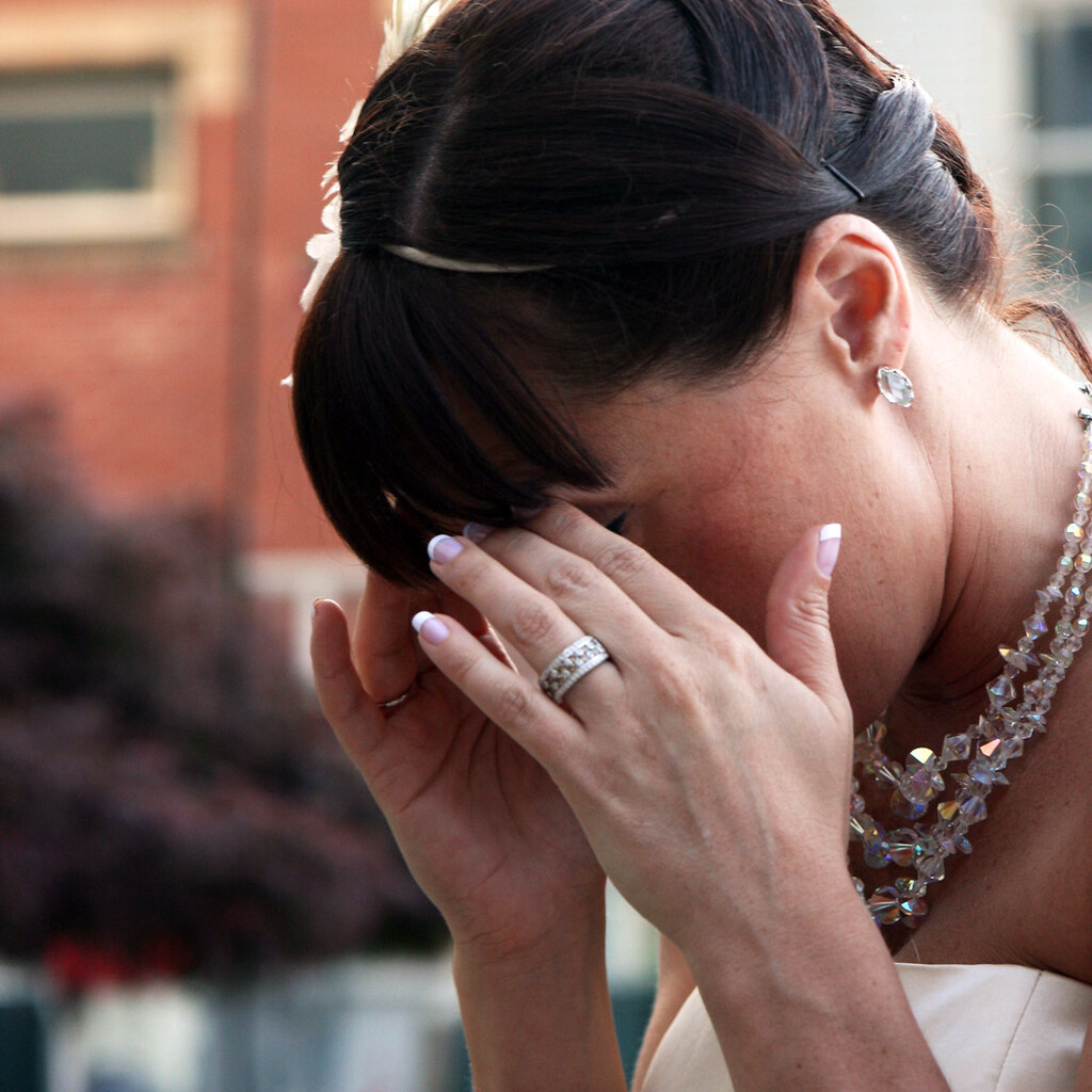 Photo of a woman with a headache