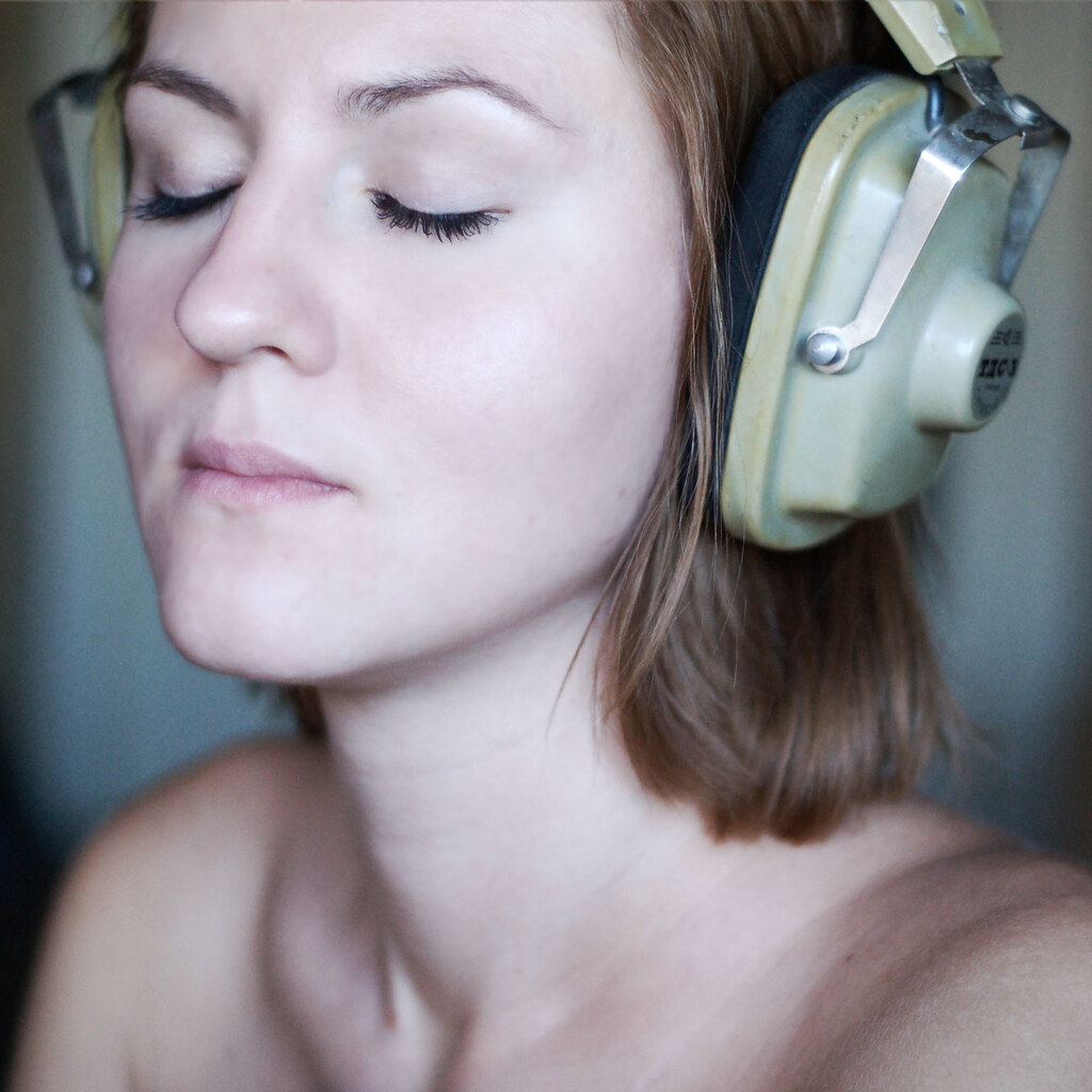 Photo of someone wearing headphones