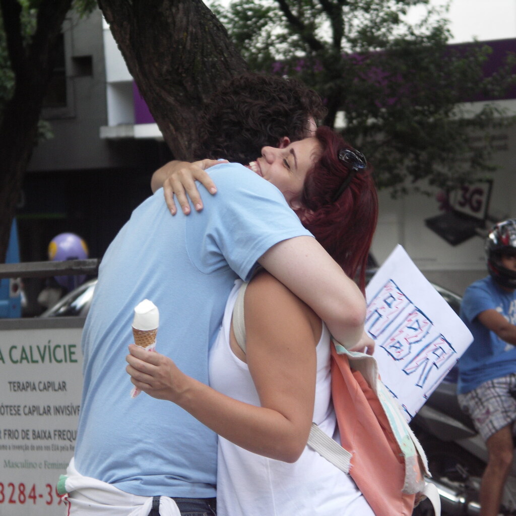 Photo of two people hugging