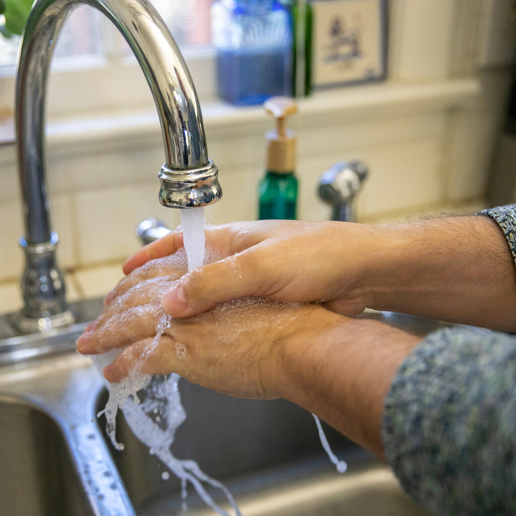 Photo of someone washing their hands