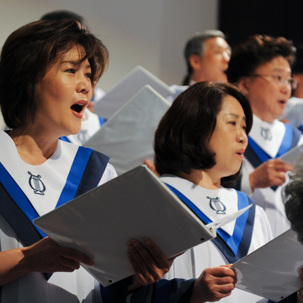 Photo of women singing hymns