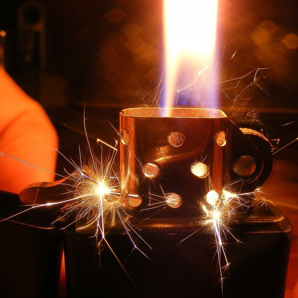 Photo of a lighter igniting