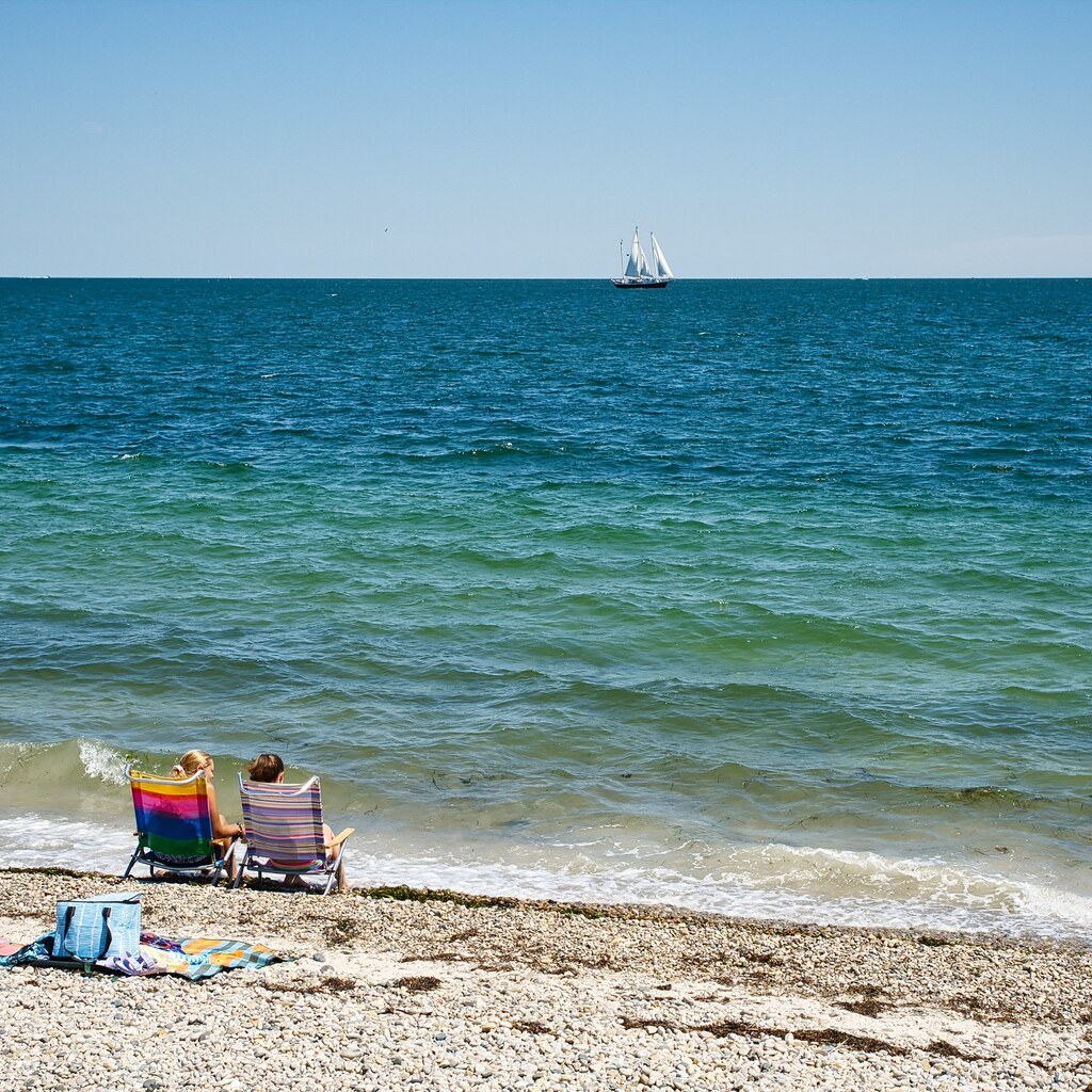 Photo of two people on the beach