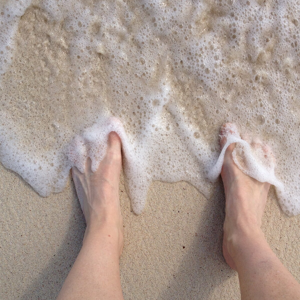 Photo of someone getting their toes wet