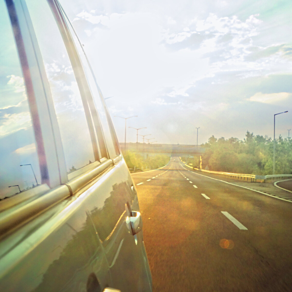 Photo of a car driving on a road