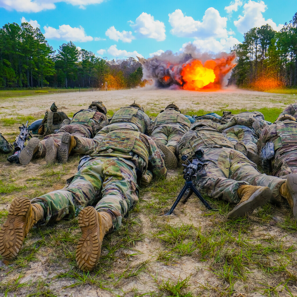 Photo of soldiers lying low