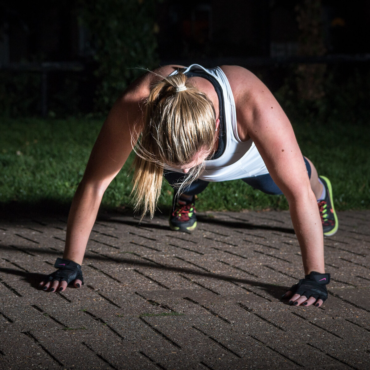 Photo of a woman doing pushups