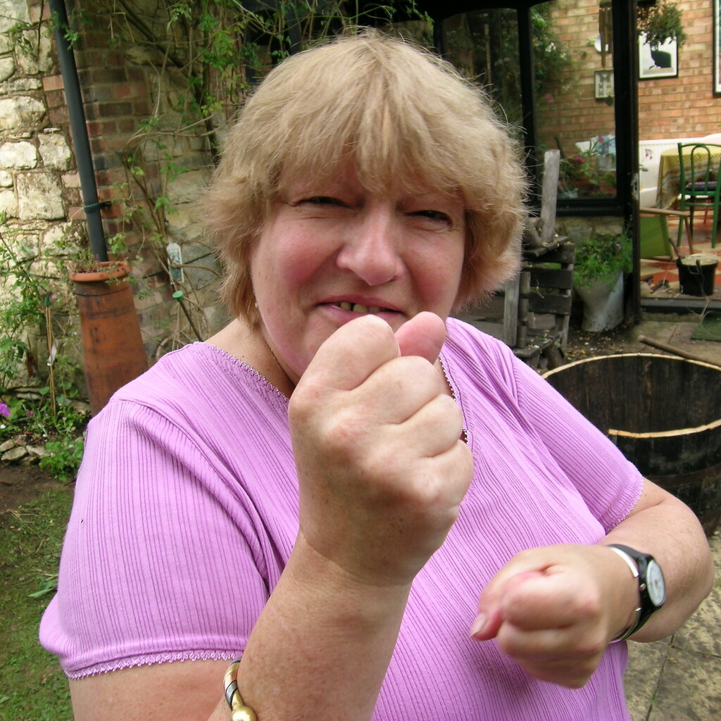 Photo of a woman putting up a fight