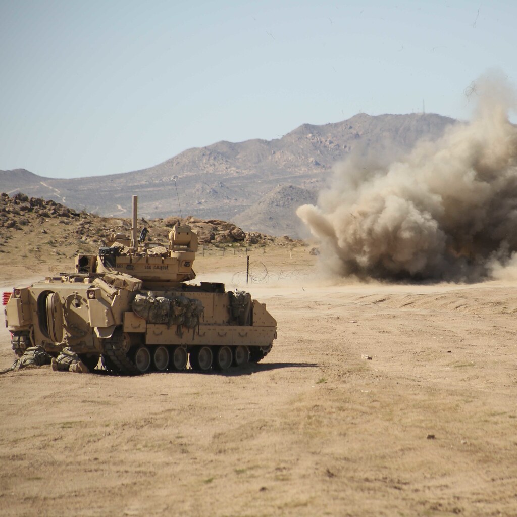 Photo of a tank under fire