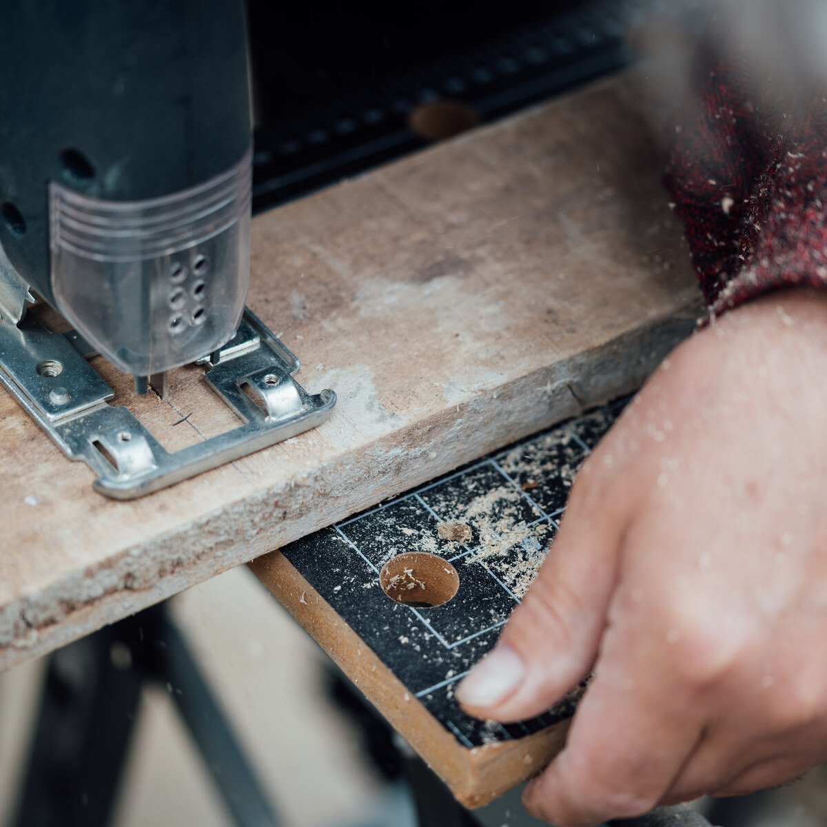 Photo of a jigsaw cutting a board