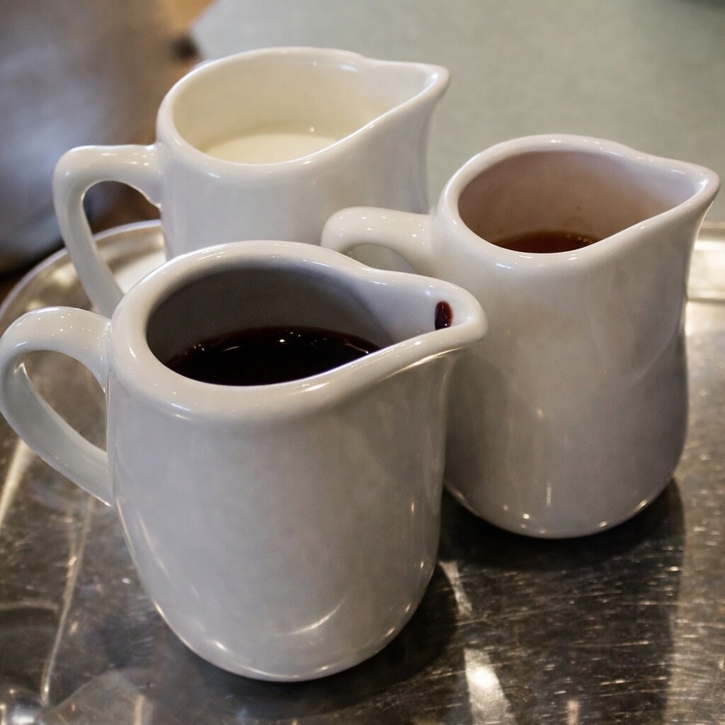 Photo of three jugs.