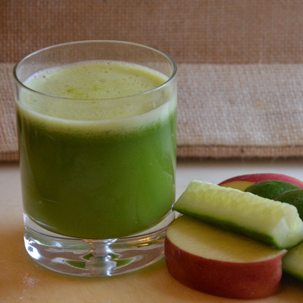 Photo of a glass of orange juice.