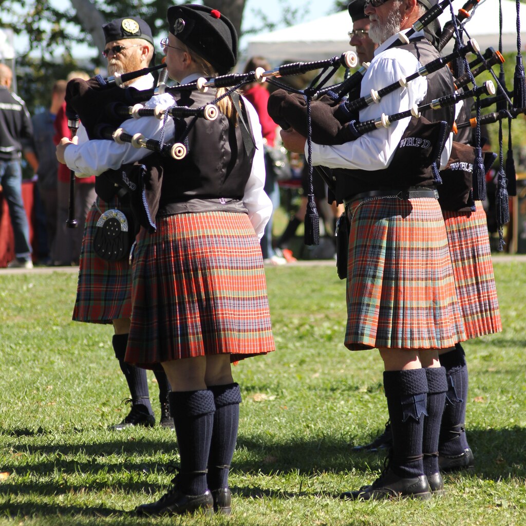 Photo of people wearing kilts