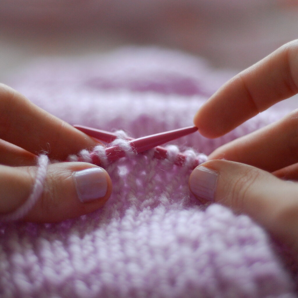 Photo of someone knitting