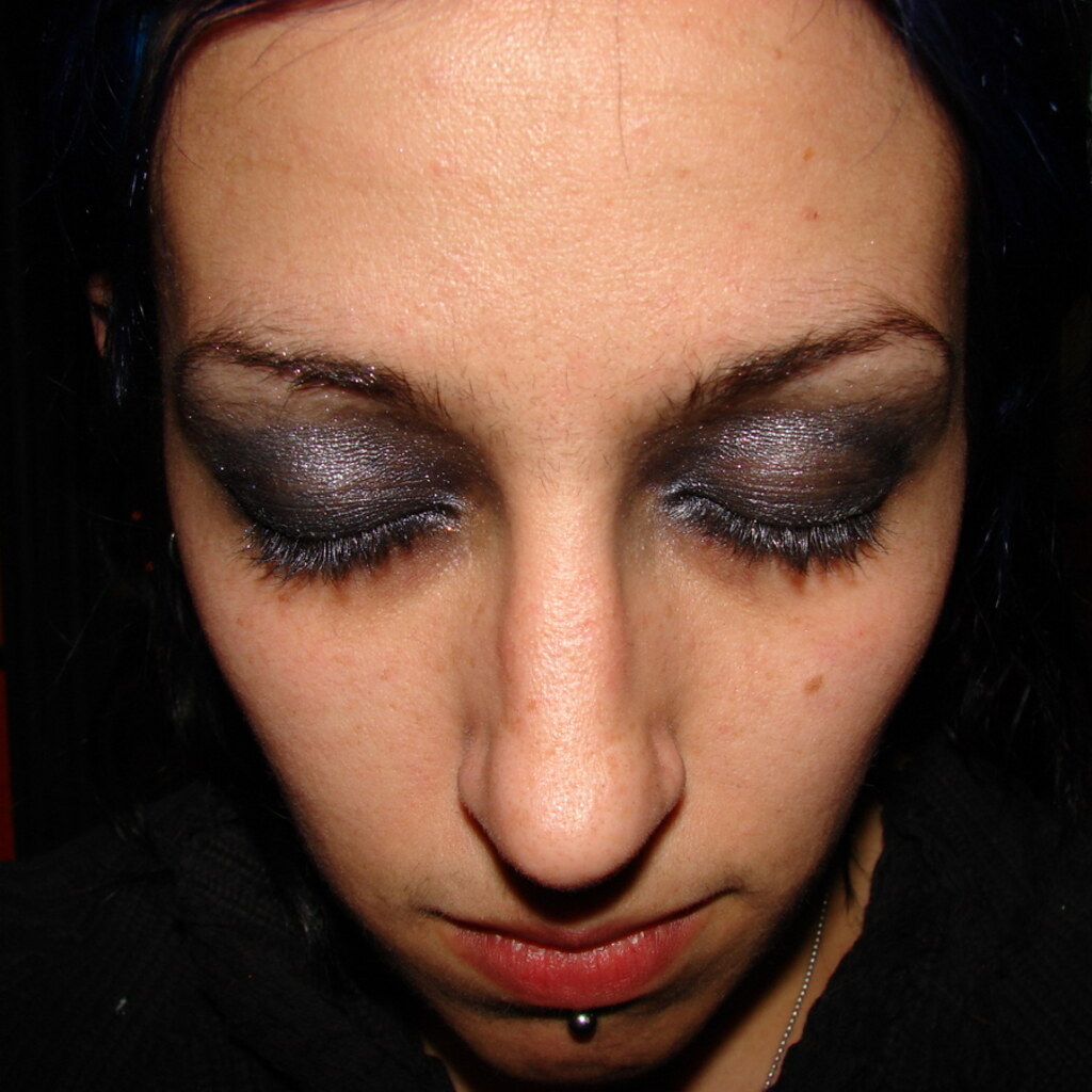 Photo of a woman with dark eyeshadow