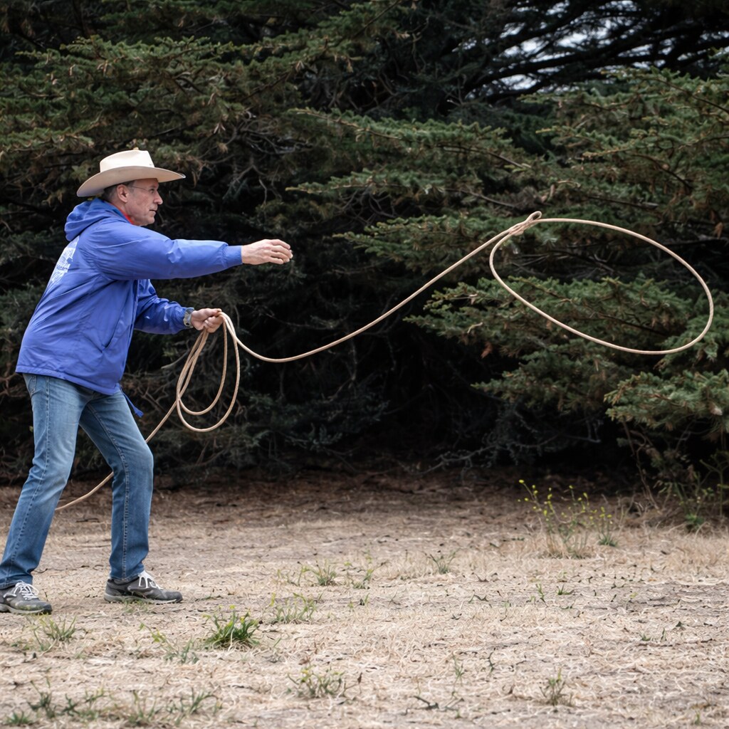 Photo of a man throwing a lasso