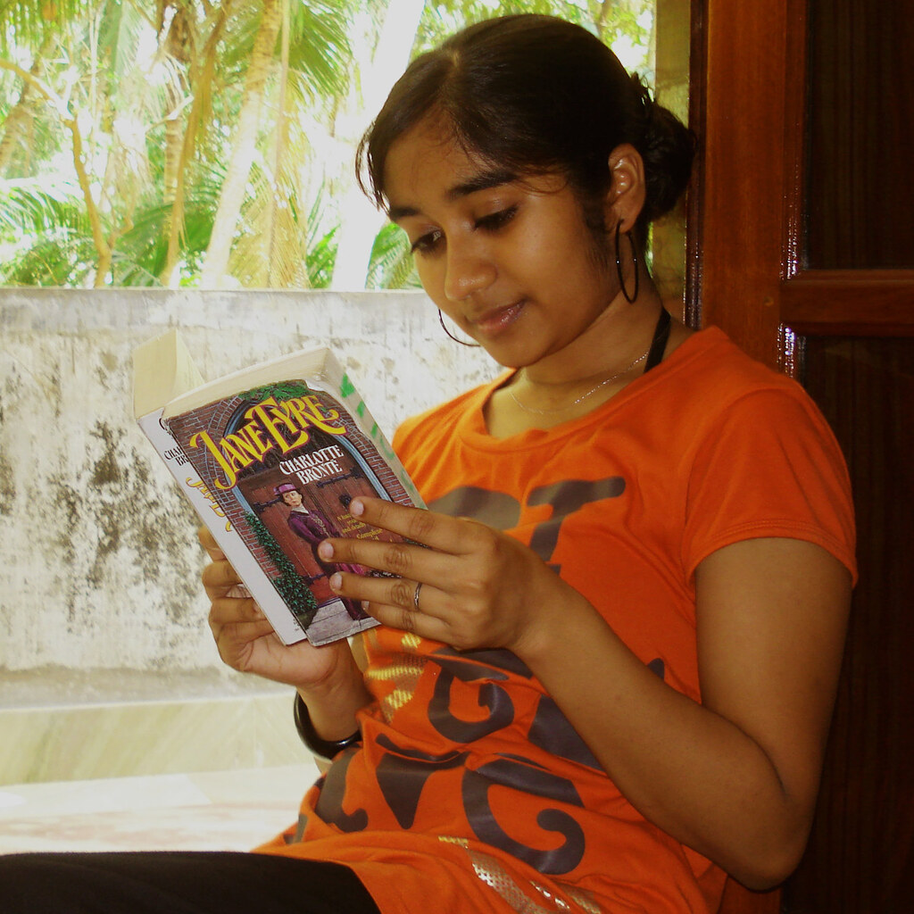 Photo of a girl reading a book
