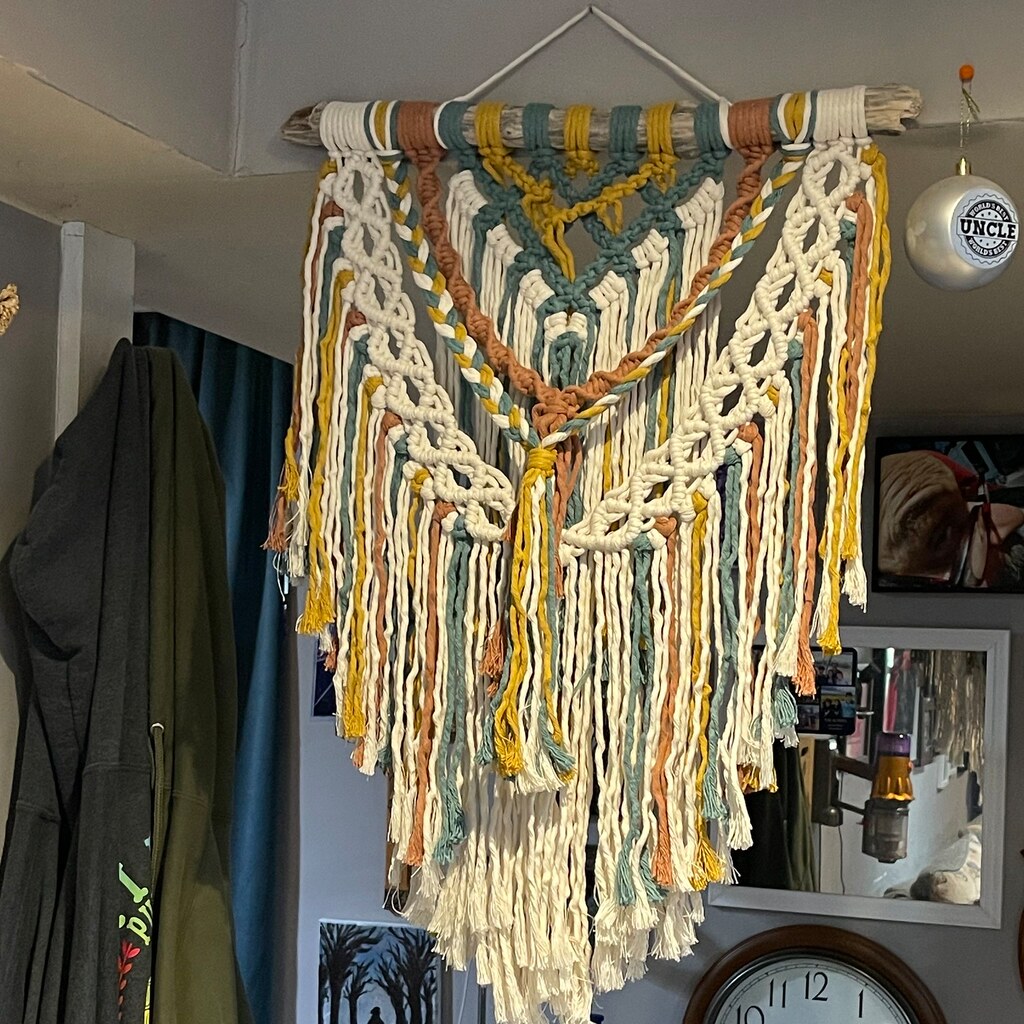 Photo of a macrame wall hanging