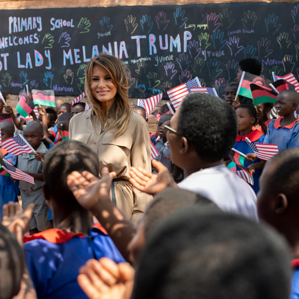 Photo of children waving Malawi flags