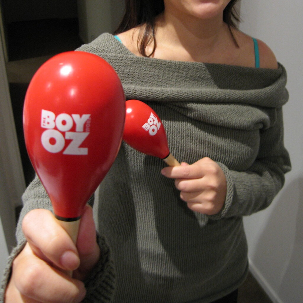 Photo of a woman playing maracas