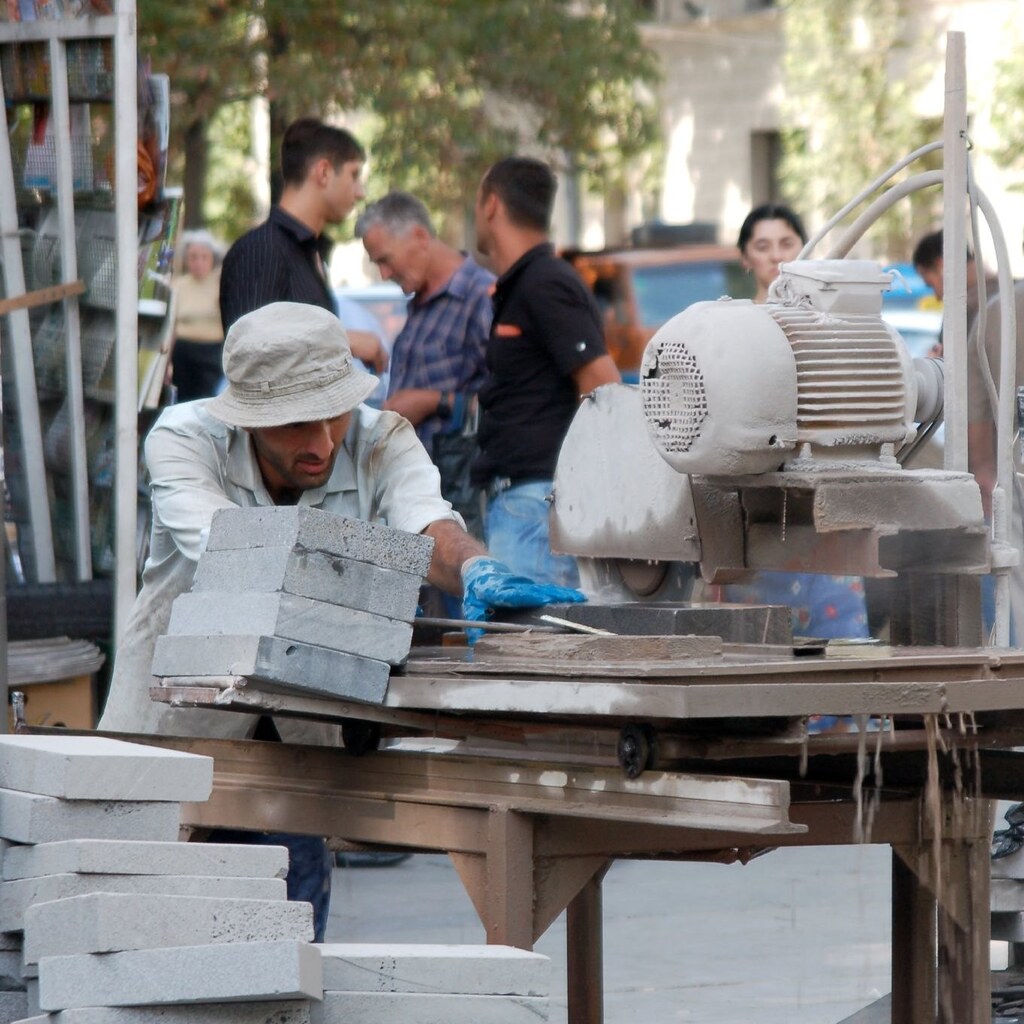 Photo of a stonemason at work