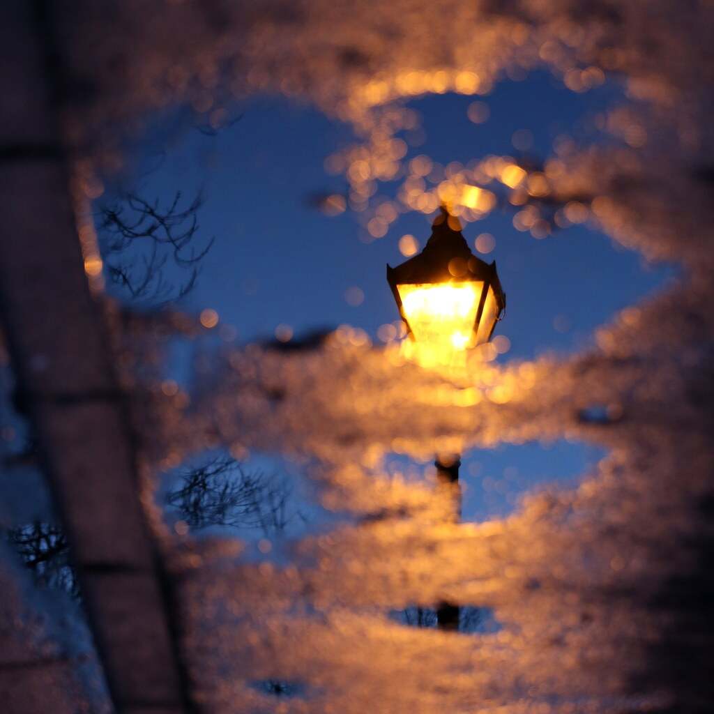 Photo of a lampost obscured by a frosty window