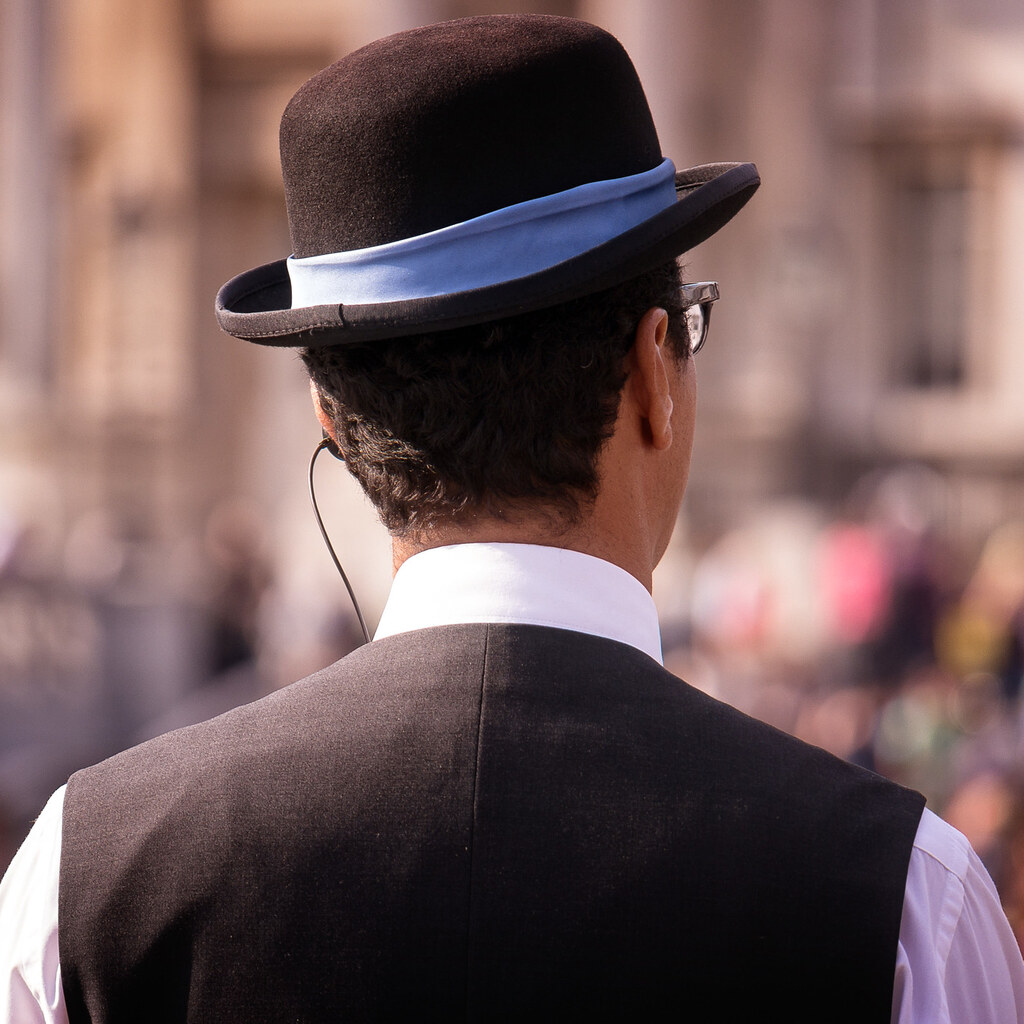 Photo of a man wearing an old fashioned hat