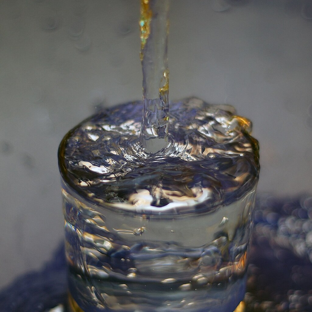 Photo of an overflowing glass