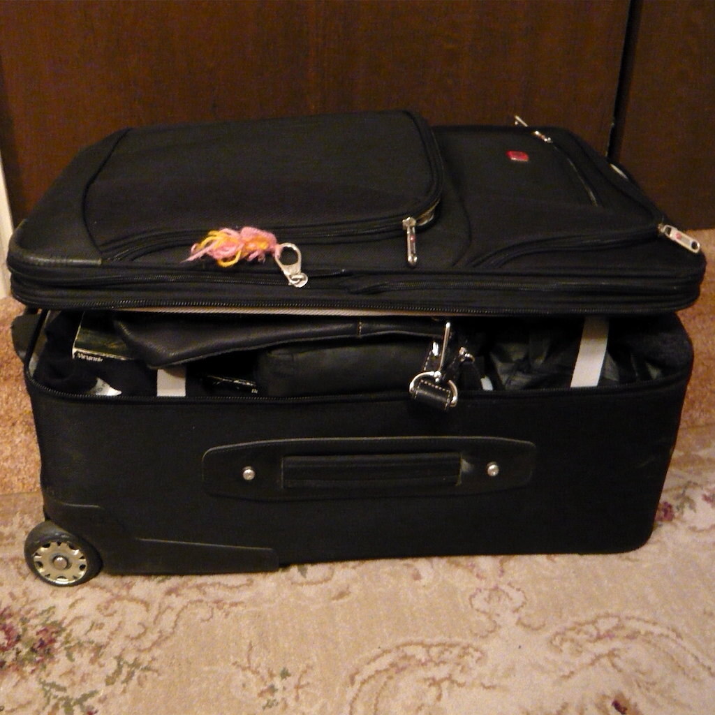 Photo of a packed suitcase